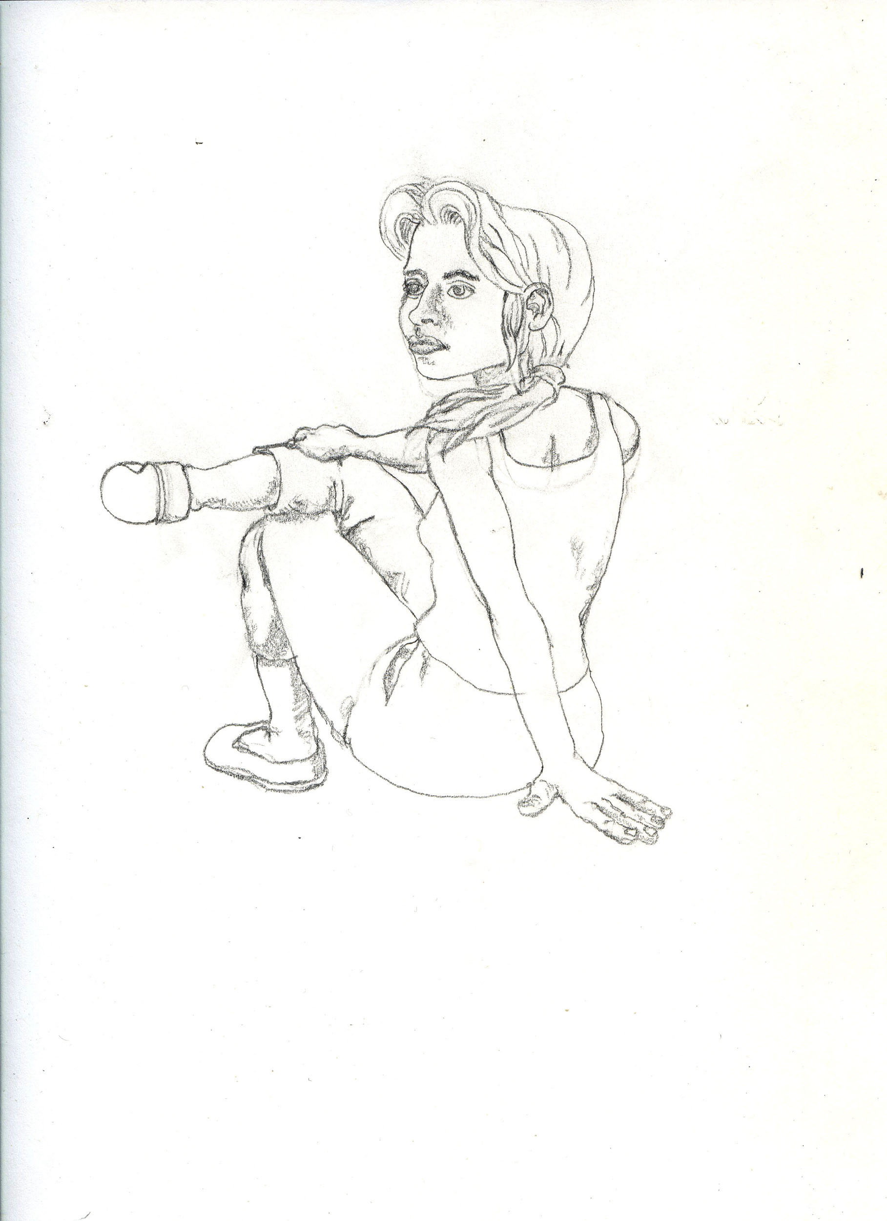 seated woman in jeans back view