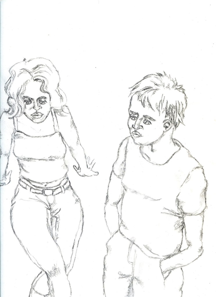 two people with a woman sitting and a man standing